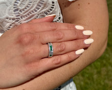 Load image into Gallery viewer, Emerald And Diamond Ring On A Hand.