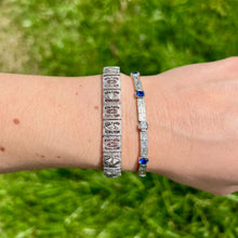 Load image into Gallery viewer, Two vintage bracelets on a wrist