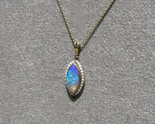 Load image into Gallery viewer, Vintage 14K yellow gold opal and seed pearl pendant necklace side view.