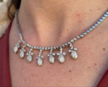 Load image into Gallery viewer, Vintage 14k white gold dangler necklace with 4.50CTW natural diamonds worn on a neck.