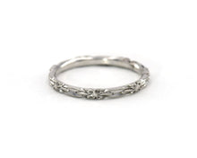 Load image into Gallery viewer, Vintage 14K white gold wedding band featuring beautifully carved flowers in an eternity style.