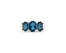 Load image into Gallery viewer, 14k yellow gold and London blue topaz three stone ring.