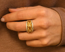 Load image into Gallery viewer, 14k yellow gold ring set with citrines and diamonds on hand.