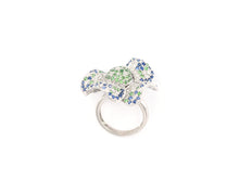 Load image into Gallery viewer, 18K white gold diamond, blue sapphire, and green garnet flower cocktail ring.