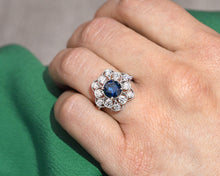 Load image into Gallery viewer, 18K white gold fancy blue and white diamond flower ring.