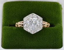 Load image into Gallery viewer, Antique 14K yellow and white gold ring set with a round brilliant cut diamond.