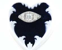 Load image into Gallery viewer, Antique platinum ring set with a GIA certified round brilliant cut diamond in box.