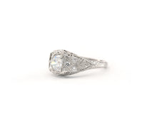 Load image into Gallery viewer, Antique platinum ring set with a GIA certified round brilliant cut diamond.