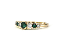 Load image into Gallery viewer, Bezel Set Emerald And Diamond Ring Side View.
