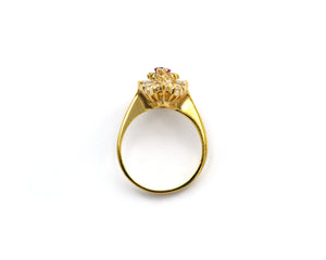 Marquise Ruby Ring With A Baguette Diamond Halo