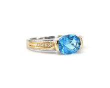 Load image into Gallery viewer, Two Tone Gold Blue Topaz And Diamond Ring
