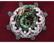 Load image into Gallery viewer, 14K white gold + yellow gold, diamond, enamel, ruby, and emerald enchanting snake brooch/pendant.
