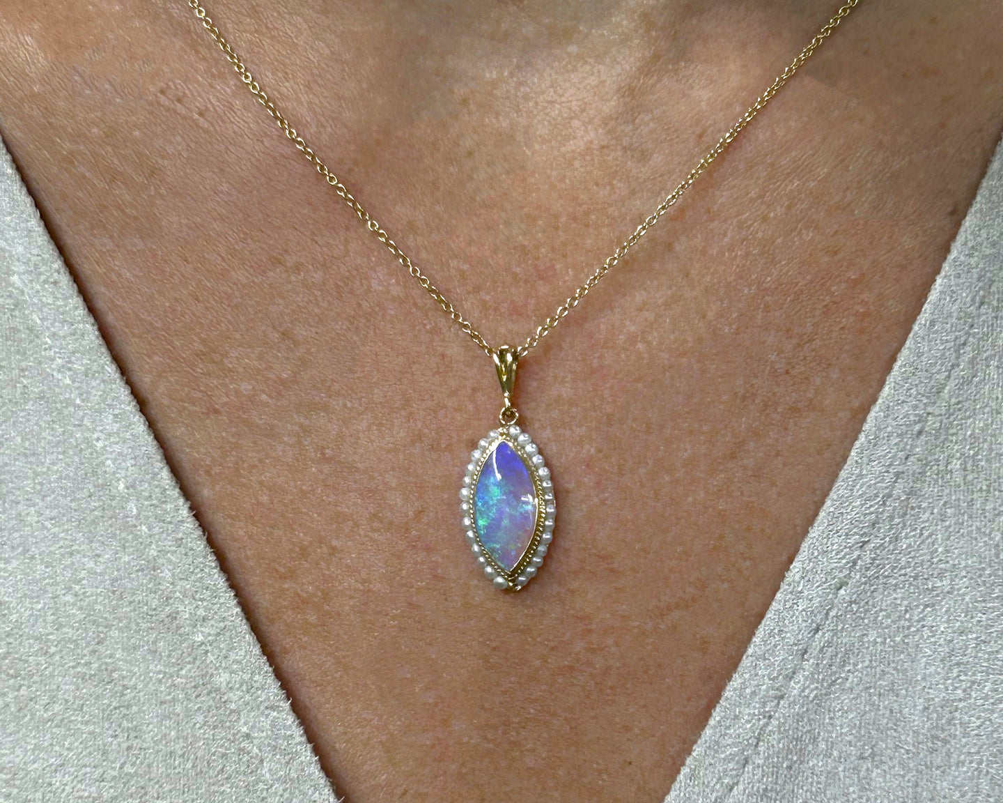 Vintage 14K yellow gold opal and seed pearl pendant necklace.