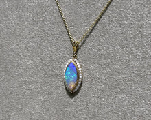 Load image into Gallery viewer, Vintage 14K yellow gold opal and seed pearl pendant necklace side view.
