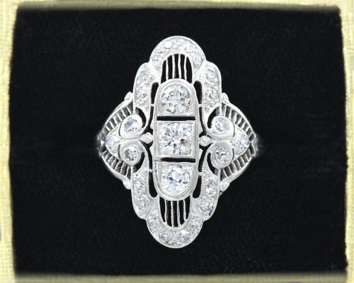 Vintage Platinum Filigree Ring Set With Old European cut, Old Mine cut, and Single cut Diamonds.