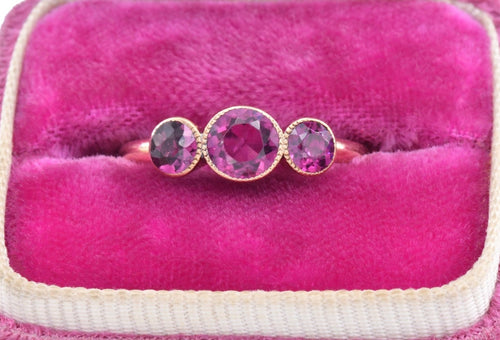 Vintage retro 14K rose gold and pink tourmaline three stone ring.