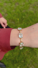 Load and play video in Gallery viewer, Vintage Emerald Cut Aquamarine Bracelet
