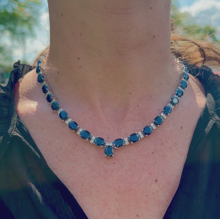 Video of Estate Oval Sapphire And Diamond Necklace on a neck.