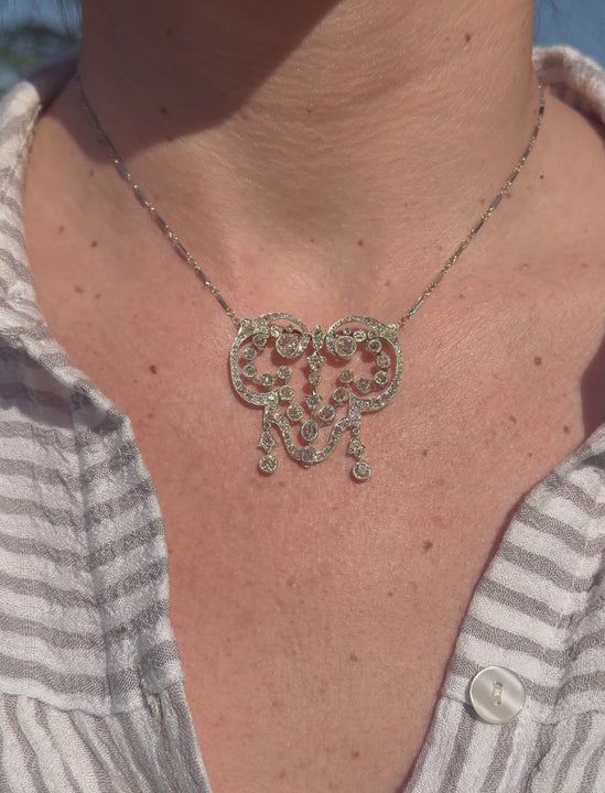 A video of Edwardian Antique Diamond Necklace on a neck.