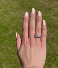 Load and play video in Gallery viewer, Emerald And Diamond Ring On A Hand In A Video.
