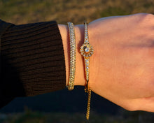 Load image into Gallery viewer, Vintage Diamond Flower Bangle Bracelet with pave diamond bracelet on a wrist.
