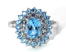 Load image into Gallery viewer, Blue topaz and white sapphire halo cocktail ring
