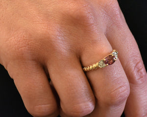 14K yellow gold pink tourmaline and diamond ring.