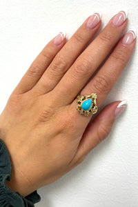 14K Yellow Gold Ring Set With Synthetic Turquoise And Diamonds