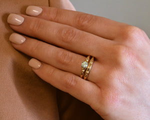 14K yellow gold + 18k white gold diamond engagement ring and wedding band set.