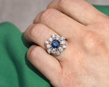 Load image into Gallery viewer, 18K white gold fancy blue and white diamond flower ring.

