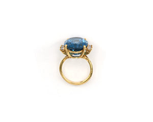 Yellow gold blue topaz and diamond ring