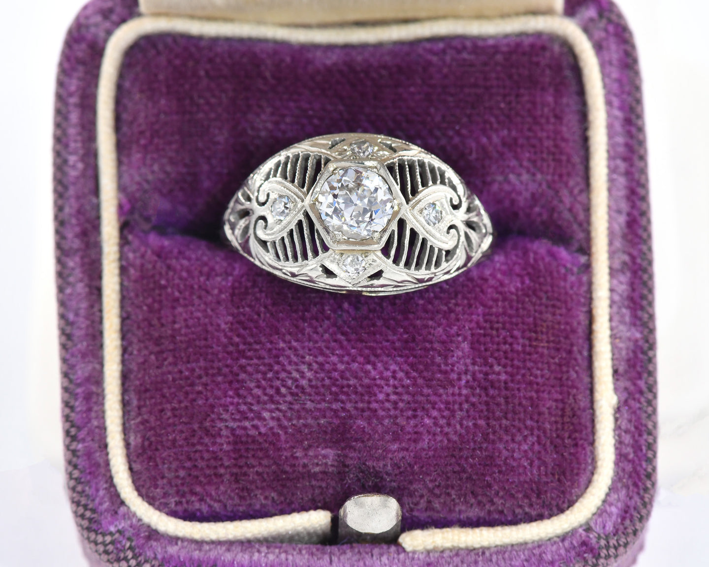 Antique 18k white gold filigree and diamond ring.