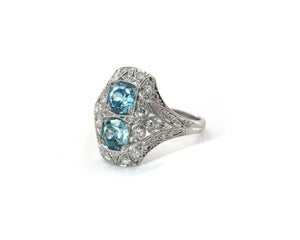Antique platinum blue zircon and diamond ring.