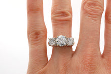 Load image into Gallery viewer, 3-Stone Diamond Engagement Ring on Hand
