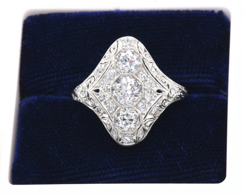Vintage Platinum Ring Set With Old European, Old Mine, And Round Brilliant cut Diamonds in box.