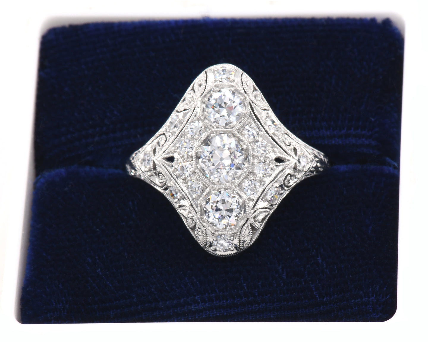 Vintage Platinum Ring Set With Old European, Old Mine, And Round Brilliant cut Diamonds in box.