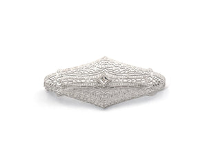 Vintage signed Esemco 10K white gold filigree brooch set with diamond.