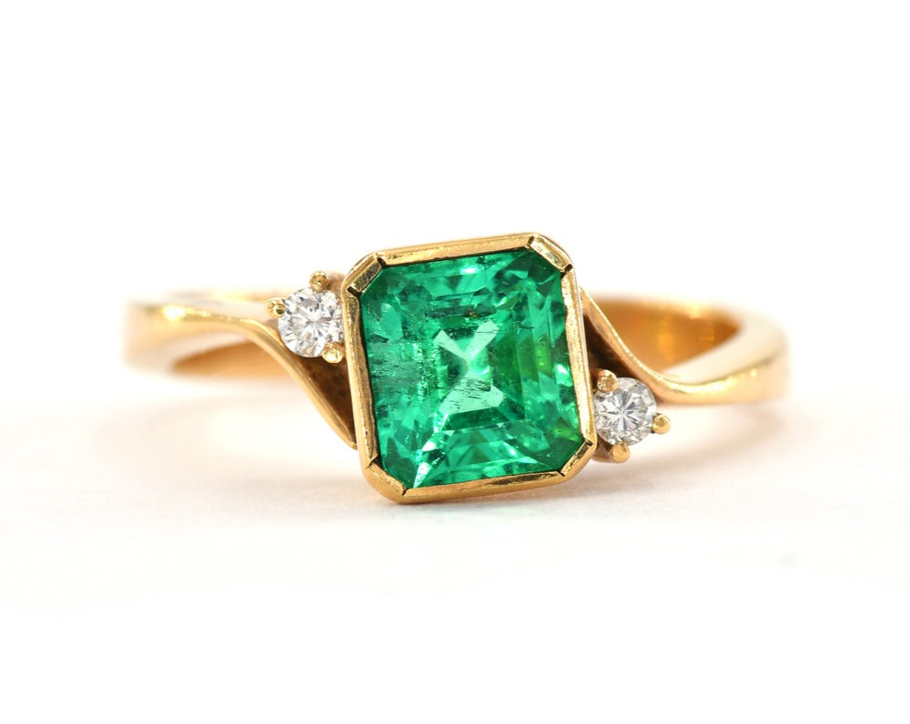 Bezel Set Emerald and Diamonds Ring